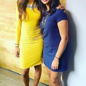 Yellow dress (on left)